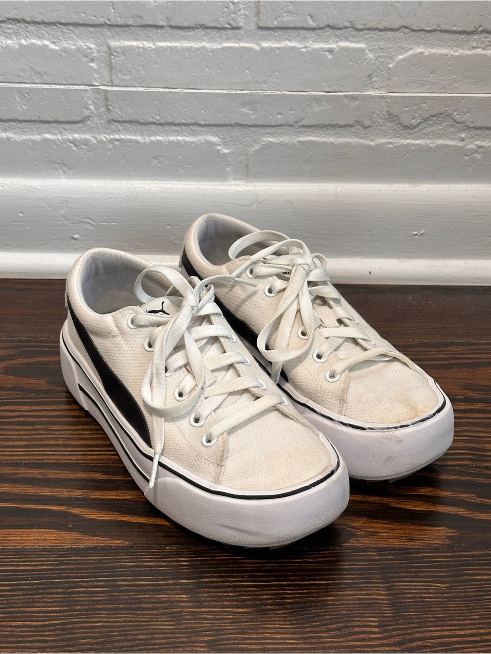 Puma white and black platform sneakers